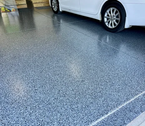 NC garage floor experts preparing epoxy coating installation