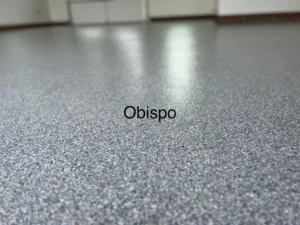 Obispo decorative flake color sample for polyaspartic garage floor coating, offered by NC Garage Floors in Raleigh